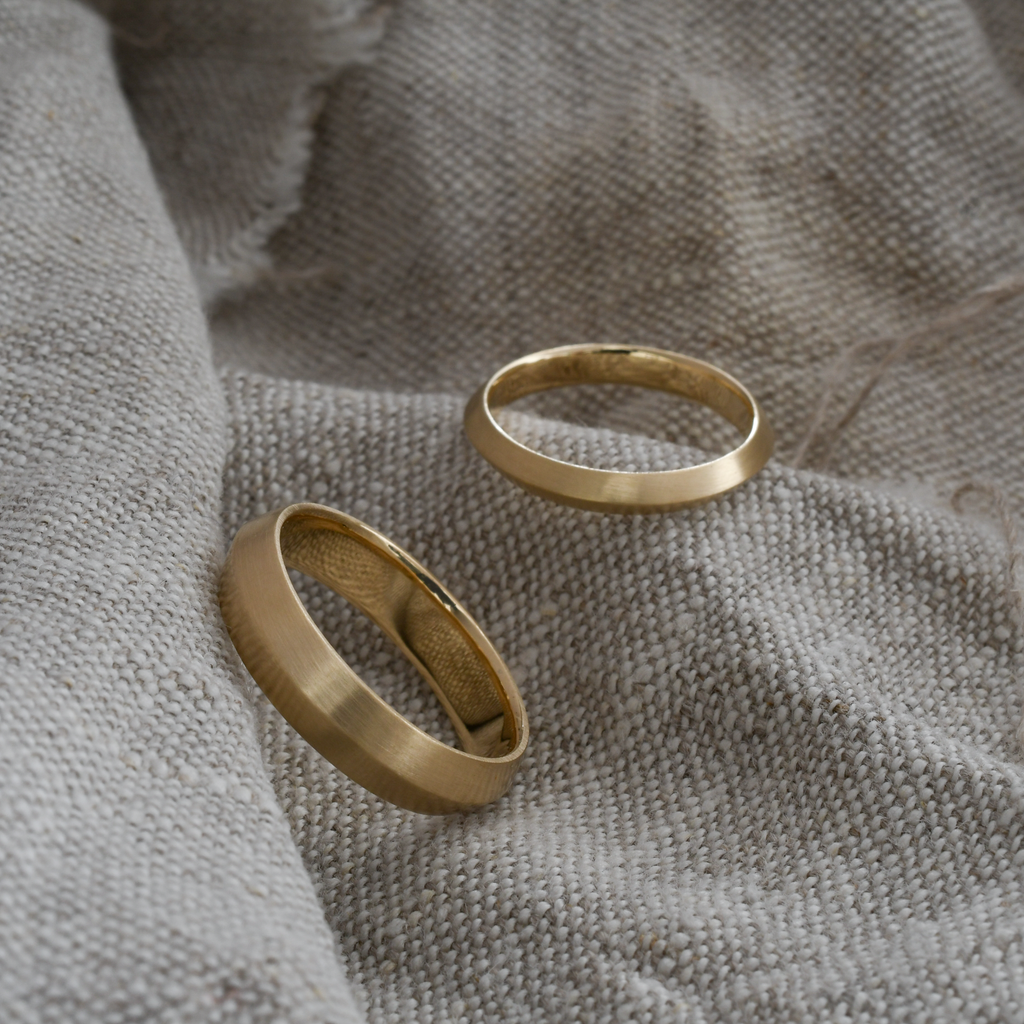 Knife Edge ethical and eco-friendly gold wedding bands.