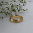 Knife Edge eco-conscious recycled gold wedding band