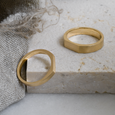 Signet shaped ethical recycled gold wedding bands