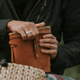 Man wearing a sustainable silver ring. This artisan  Squared Band is handmade in Cape Town in recycled silver from e-waste.