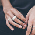 Woman wearing an ethical silver ring. This minimalist Squared Band is handmade in Cape Town in recycled silver from e-waste.