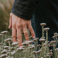 Man wearing an eco-friendly gold ring. This sustainable Strata Band is handmade in Cape Town in recycled gold from e-waste.