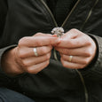 Man wearing an eco-friendly silver ring. This sustainable Flat Band is handmade in Cape Town in recycled silver from e-waste.