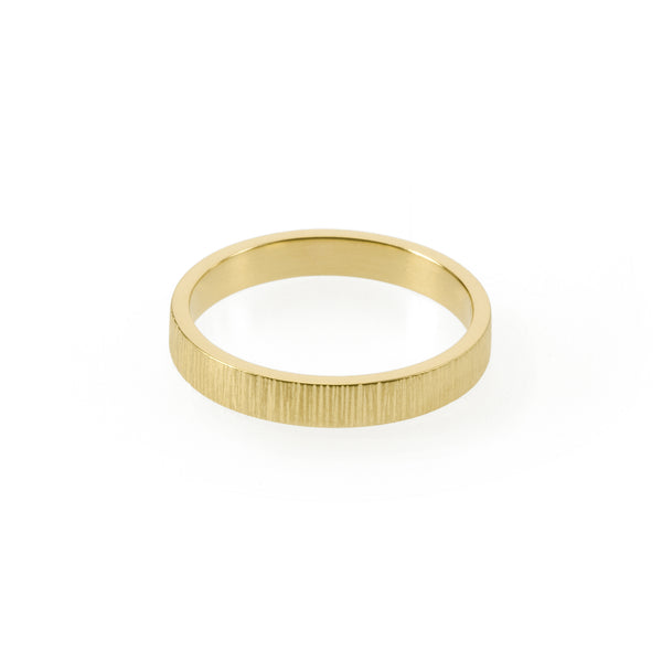 Sustainable gold ring. This artisan crafted Strata Band is handmade in Cape Town in recycled gold from e-waste.