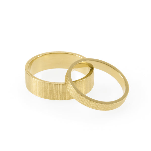 Eco-friendly gold rings. These sustainable Strata Wedding Bands are handmade in Cape Town in recycled gold from e-waste.