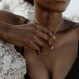 Woman wearing an eco-friendly gold ring. This sustainable Twist Ring is handmade in Cape Town in recycled gold from e-waste.