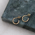 Sustainable gold earrings. These artisan crafted Twist Hoops are handmade in Cape Town in recycled gold from e-waste.