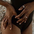 Woman wearing an eco-friendly sterling stacking silver ring. This sustainable Twist Ring is handmade in Cape Town in recycled silver from e-waste.