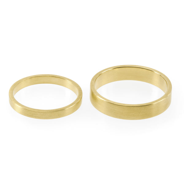 Sustainable gold rings. These ethical Flat Wedding Bands are handmade in Cape Town in recycled gold from e-waste.
