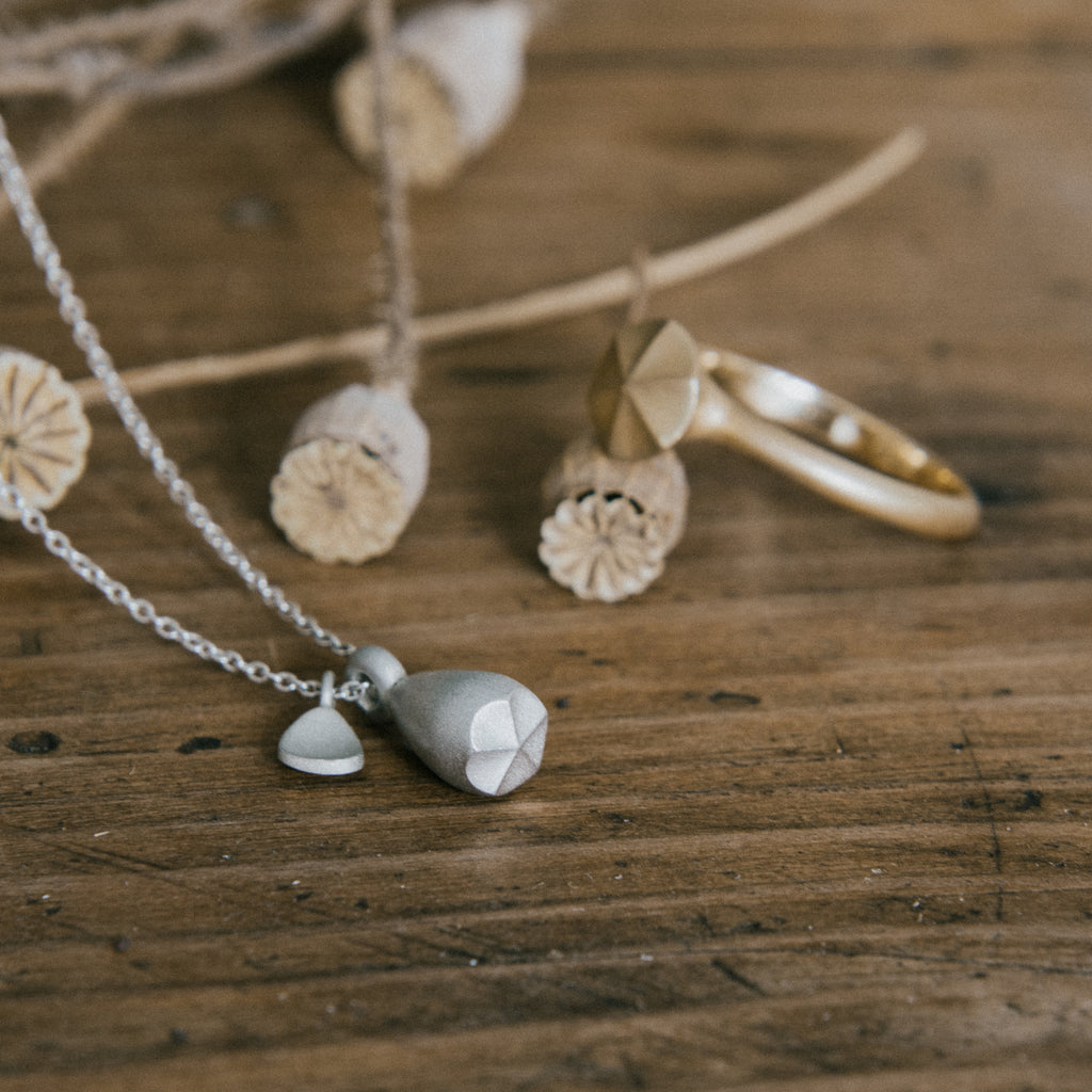 Ethical silver necklace. This eco-friendly Pod Pendant with Leaf is handmade in Cape Town in recycled silver from e-waste.