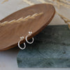 Sustainable silver earrings. These artisan crafted Twist Hoops are handmade in Cape Town in recycled silver from e-waste.