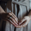 Woman wearing an eco-friendly silver stacking ring. This sustainable Traveller's Set is handmade in Cape Town in recycled silver from e-waste.